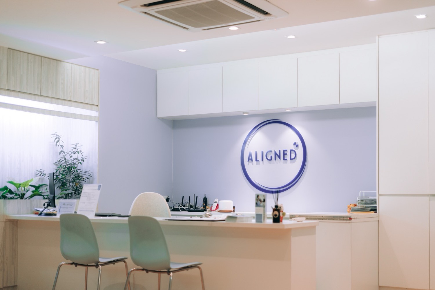 Aligned clinic reception counter and waiting seats